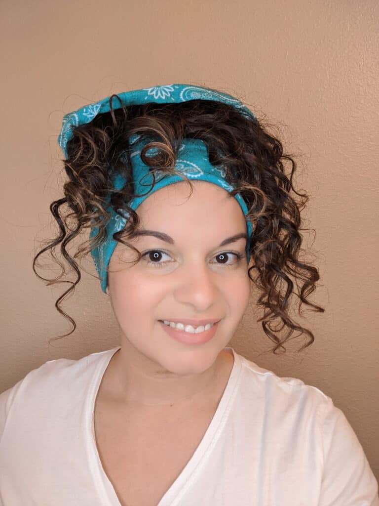 Delilah Orpi the Holistic Enchilada in a hair buff for curly hair