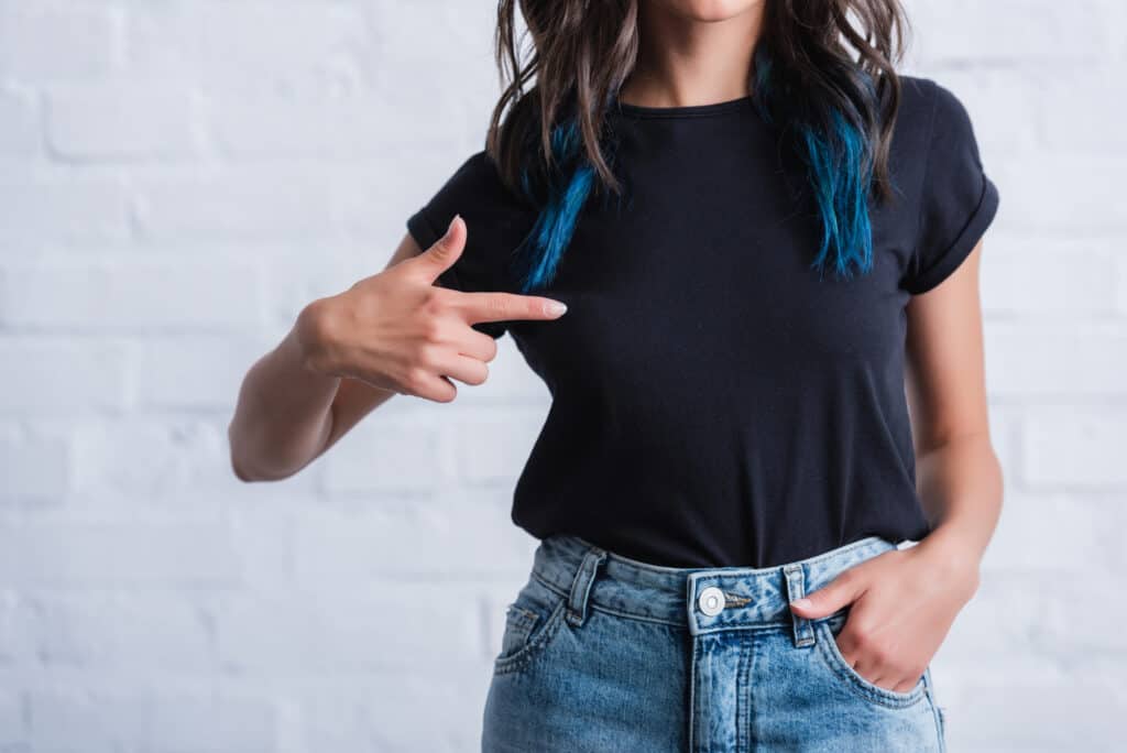 close up of woman's blue ends on her dark hair