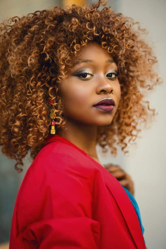 woman with curly copper hair