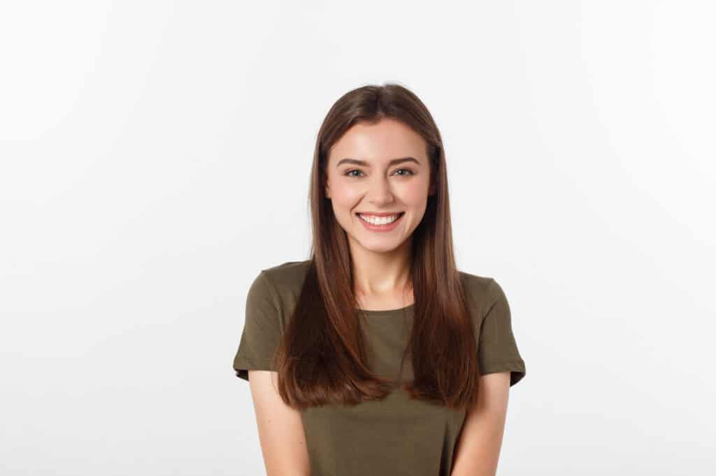 woman with type 1b hair smiling