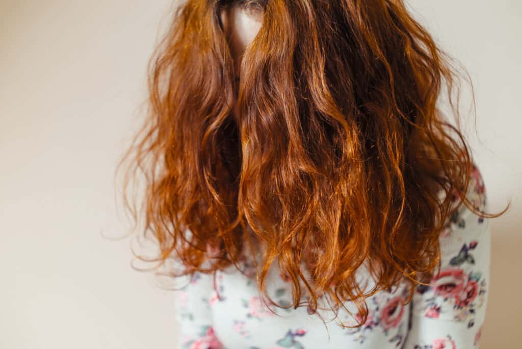 long red curly hair dyed with henna