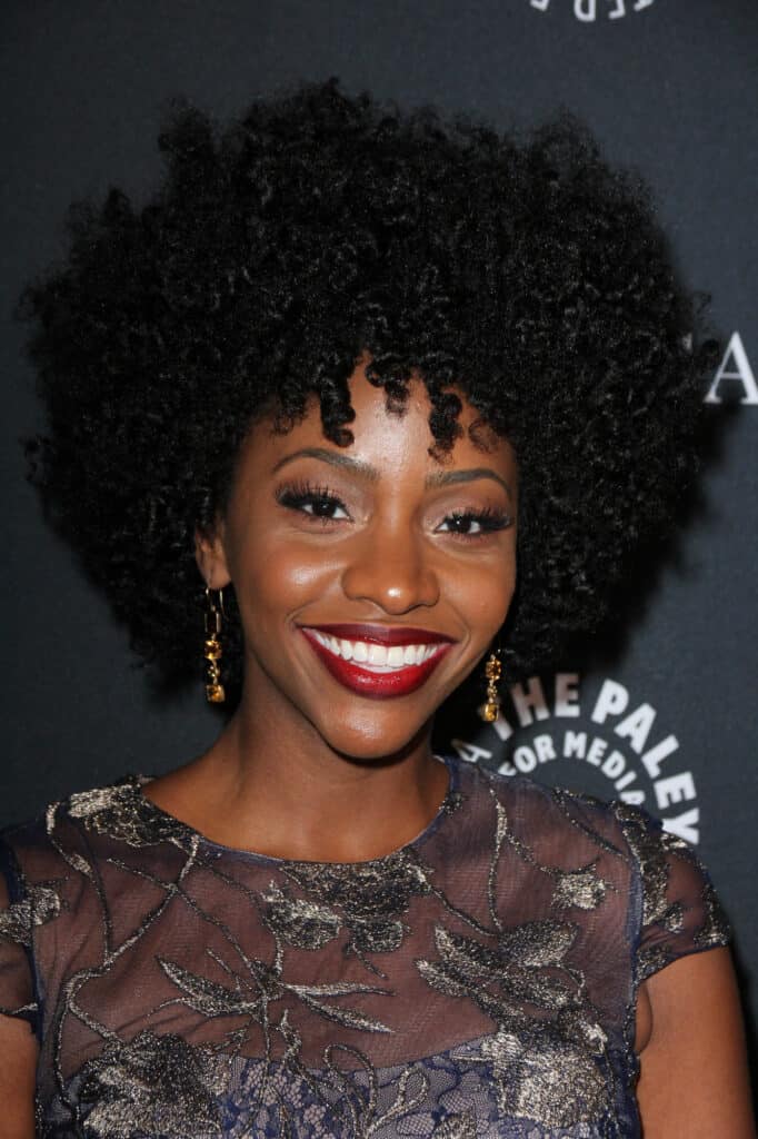 Teyonah Parris smiling